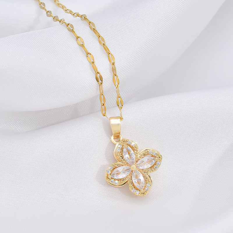 Rotatable Titanium Steel Four-petal Flower Necklace Female Inlaid Zircon Ring Earrings